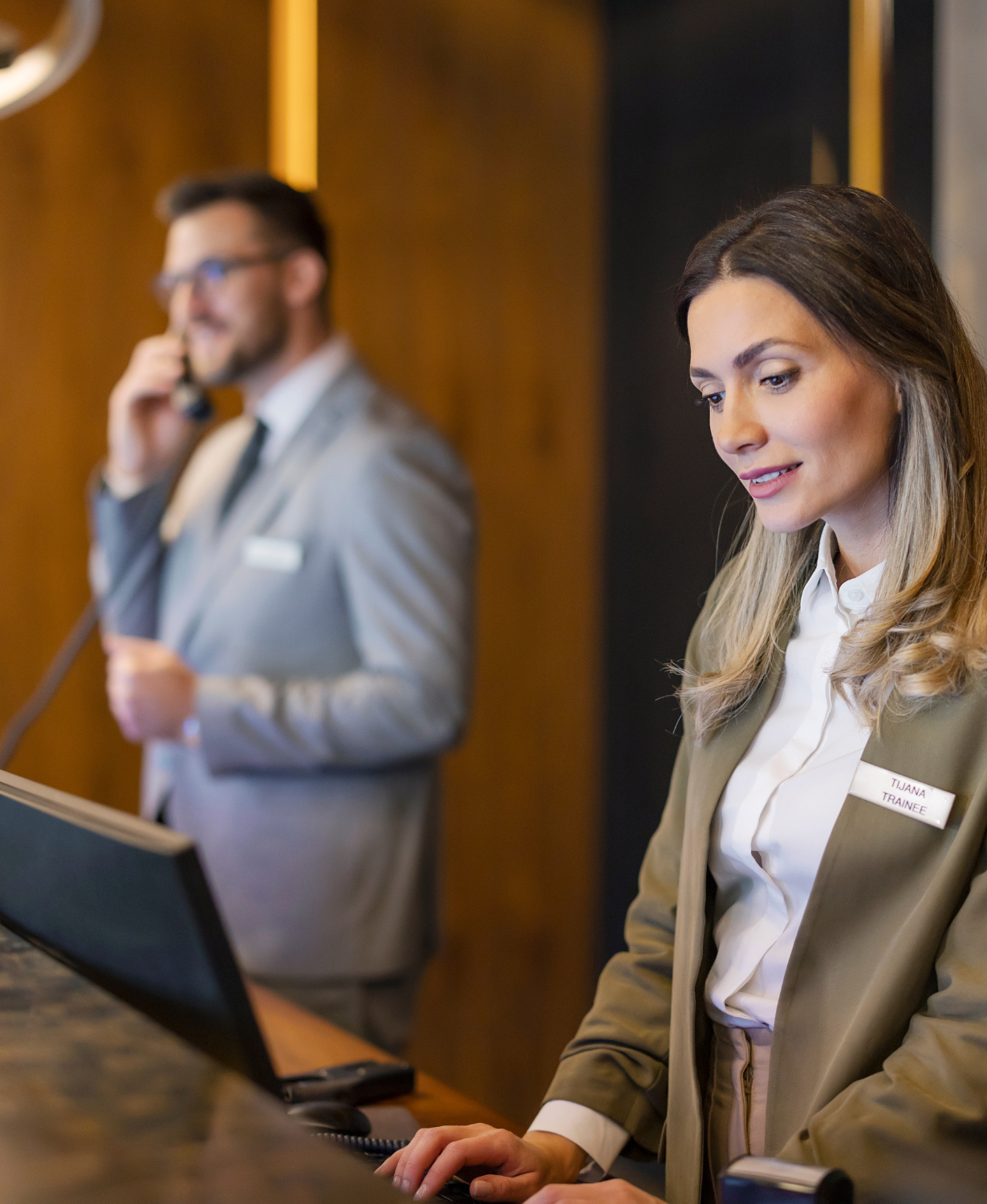 Reception Staff at Hotel Image on man looking unhappy and confused